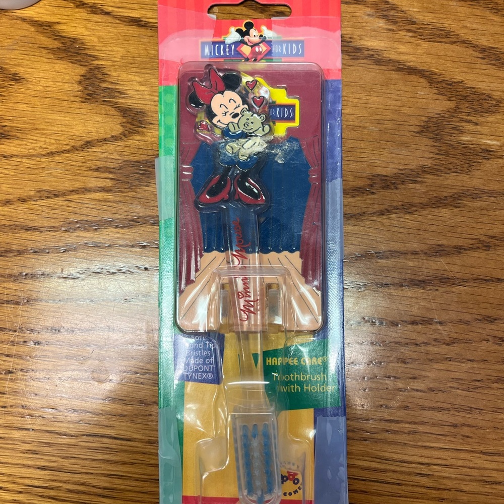 Vintage Disney Minnie Mouse toothbrush and toothbrush holder